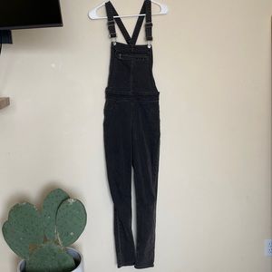 Black skinny leg overalls size 6 working front pocket